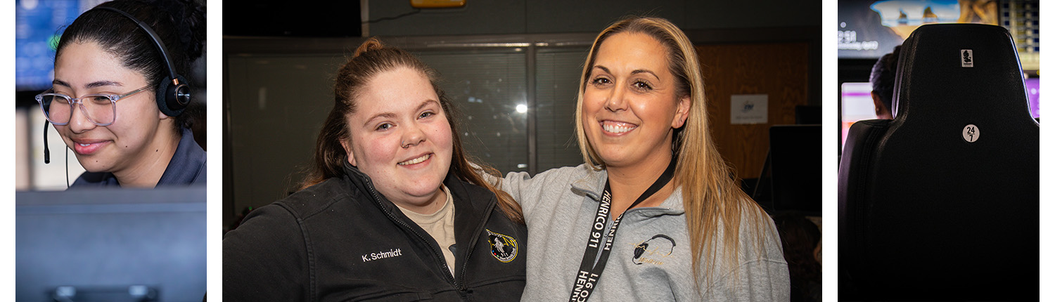 Two women smiling and posing together indoors, one wearing a black jacket and the other a gray sweatshirt with a lanyard.